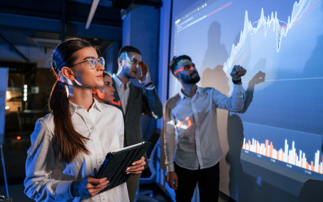 male leader talking to employees showing the plan 2025 03 18 19 40 33 utc